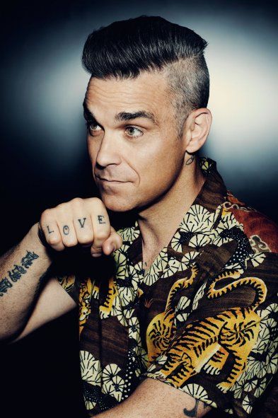 Robbie Williams protagonizará su propia biografía cinematográfica