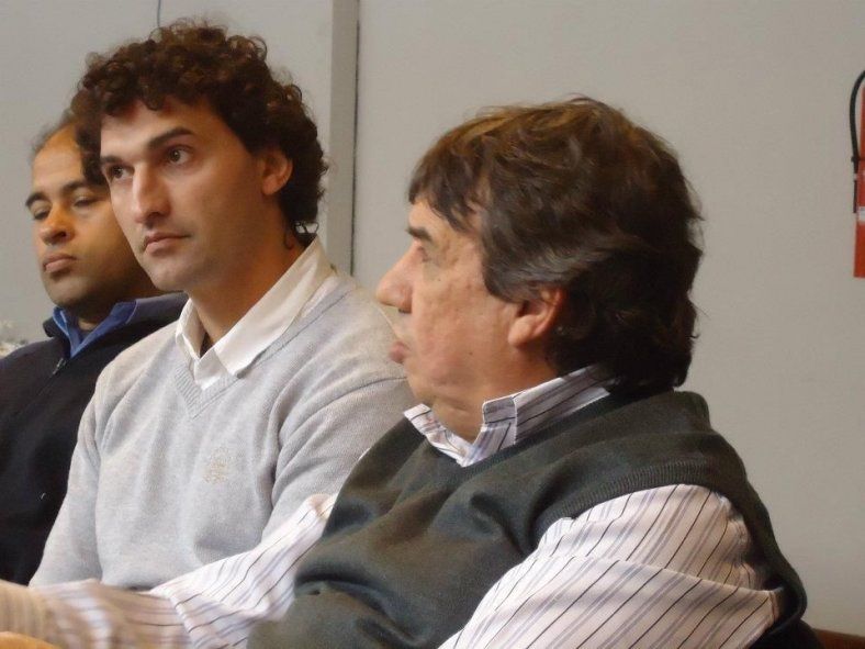 El titular del Sindicato Único de Trabajadores Municipales (SUTM), Rodolfo Cecchi, junto al líder de Fesimubo, Rubén García